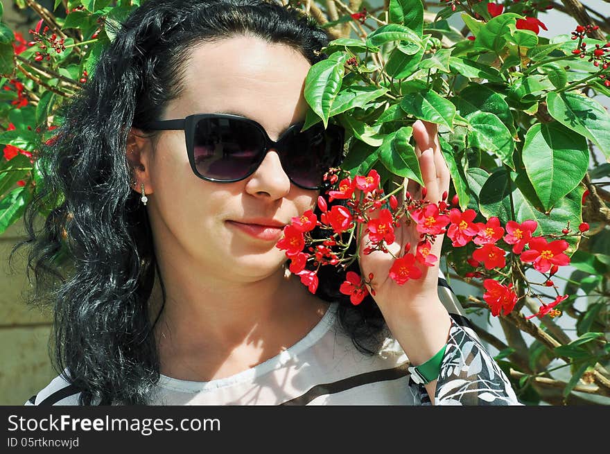 young girl on a background of flowers