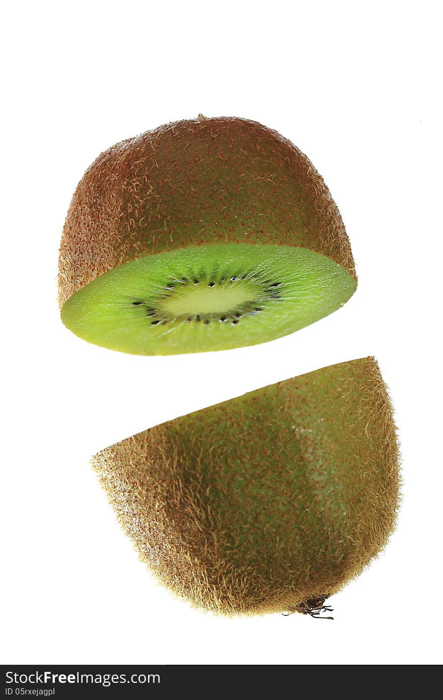 Kiwi fruit cut and isolated on white background