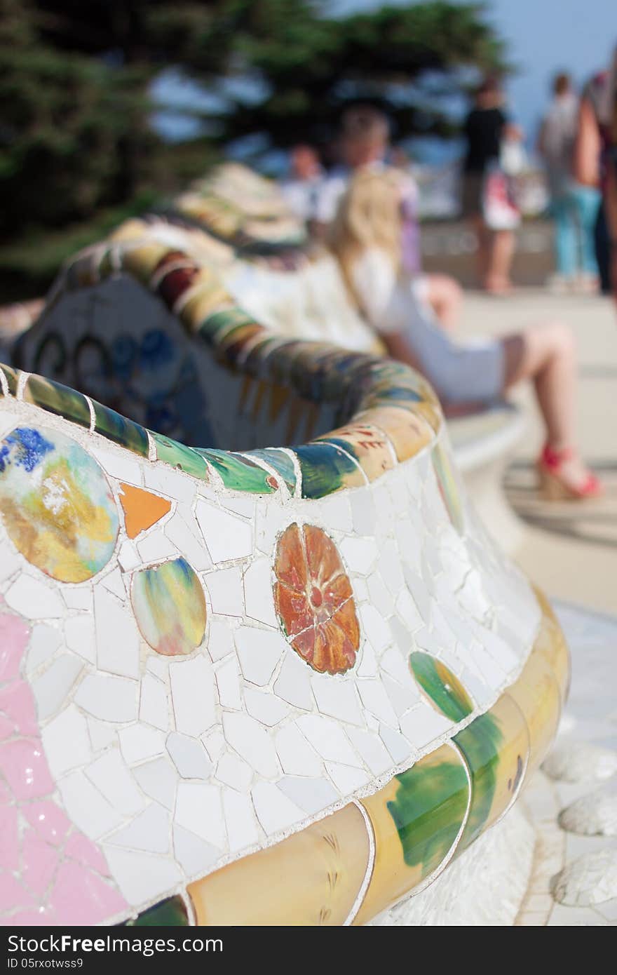 Details of a colorful ceramic bench at Parc Guell designed by Antoni Gaudi, Barcelona. Details of a colorful ceramic bench at Parc Guell designed by Antoni Gaudi, Barcelona