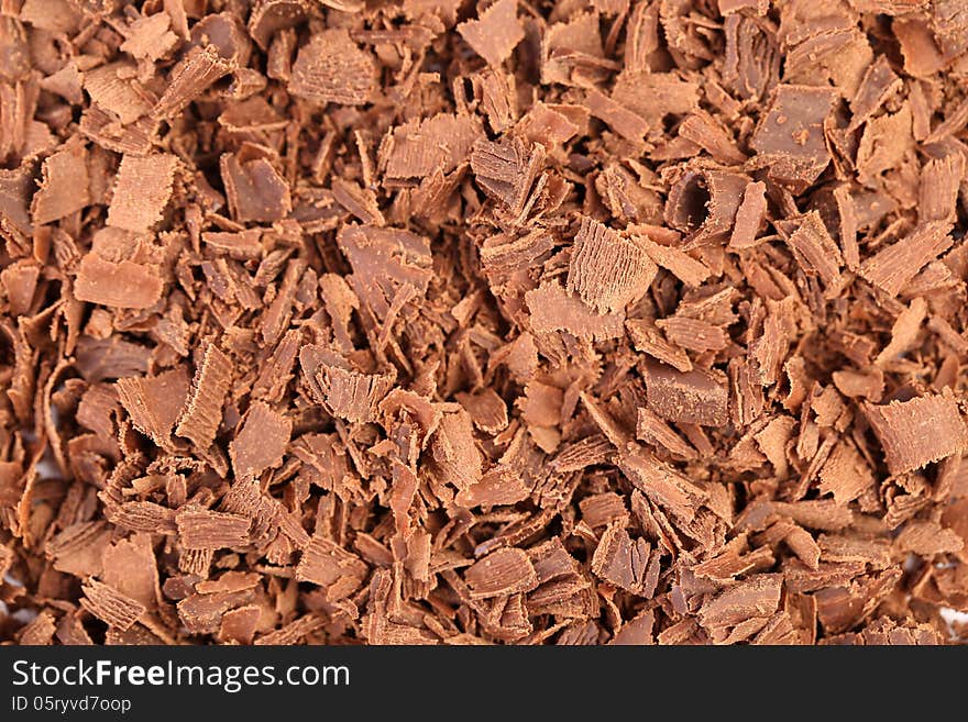 Slices of chocolate. Close up. Whole background. Slices of chocolate. Close up. Whole background.