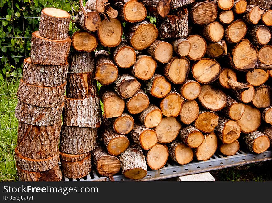 Oak fire wood stacked for the fireplace.