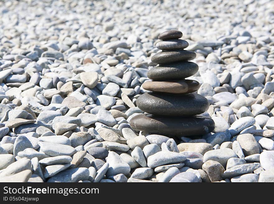 Pyramid of pebbles on the beach