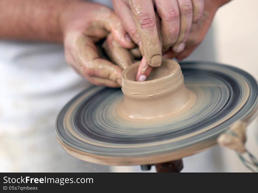 Hands Working On Pottery