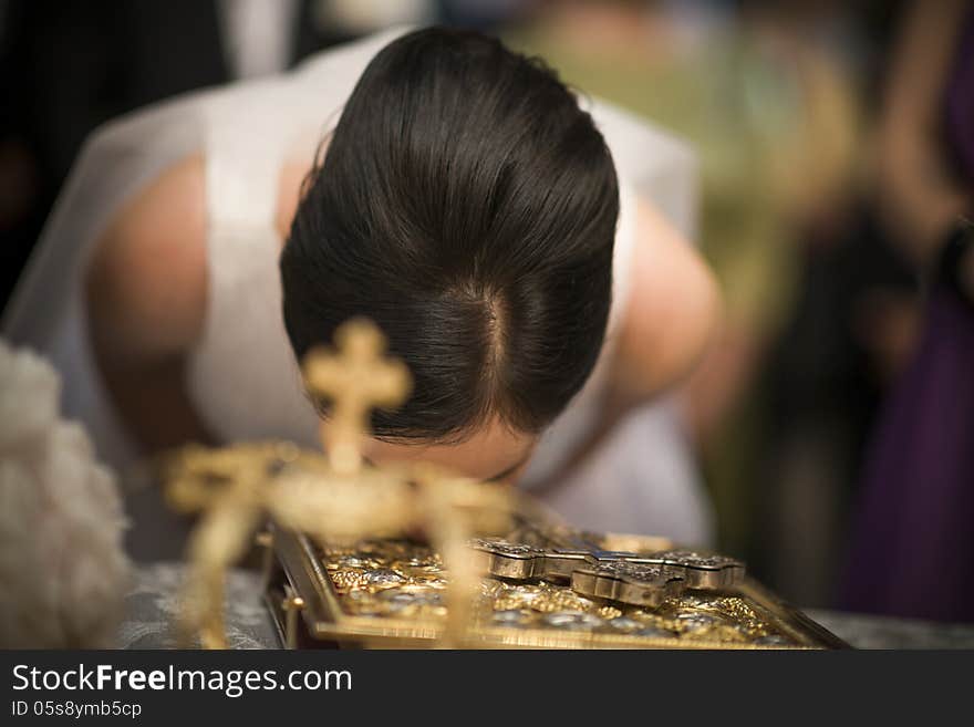 Bride kissing the holy book. Bride kissing the holy book