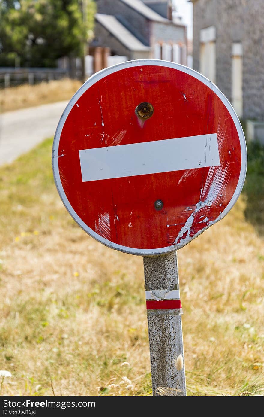 Old ''one direction'' road sign, in a french village.