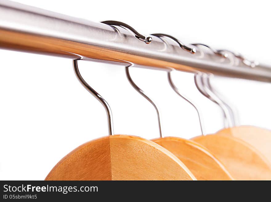 Empty raw of hangers isolated on white, sales concept