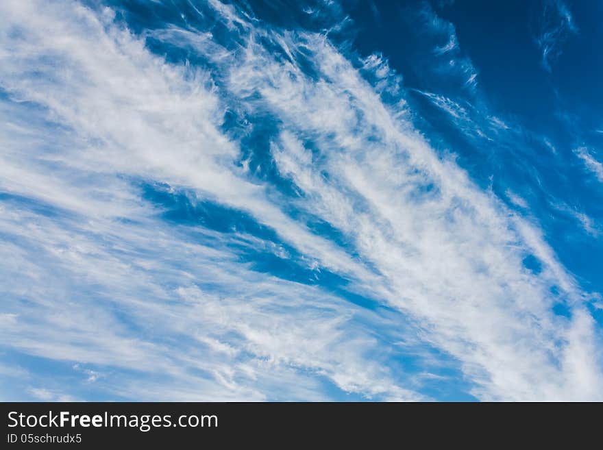 White fluffy clouds in the blue sky