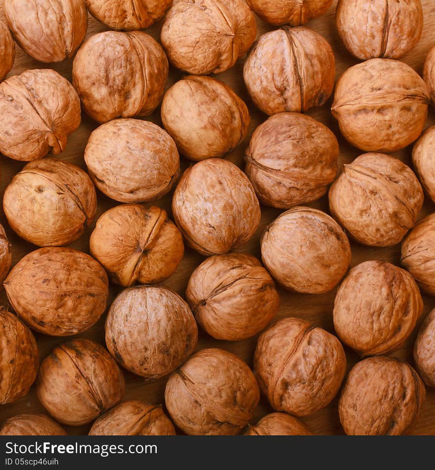 Walnuts in shells. Walnuts background