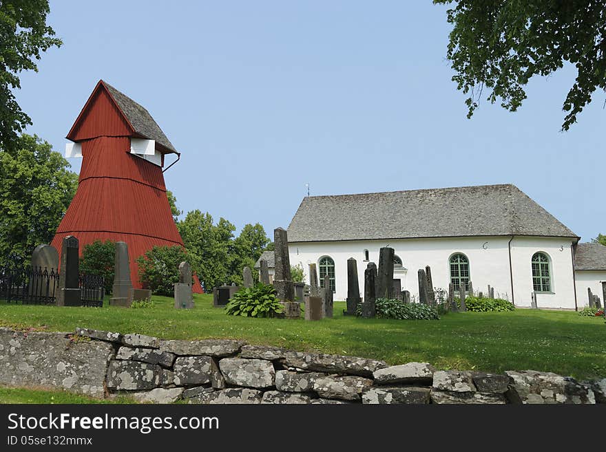 This church in the Dalsland area of Sweden near Lake Venern is interesting insofar as the clock-tower is not a part of the church building itself but was ercted some metres away from the church. This church in the Dalsland area of Sweden near Lake Venern is interesting insofar as the clock-tower is not a part of the church building itself but was ercted some metres away from the church..