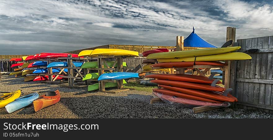 Bunch of colorful kayaks ready for rent. Bunch of colorful kayaks ready for rent