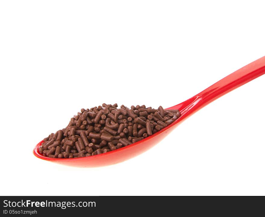 Chocolate on the red spoon