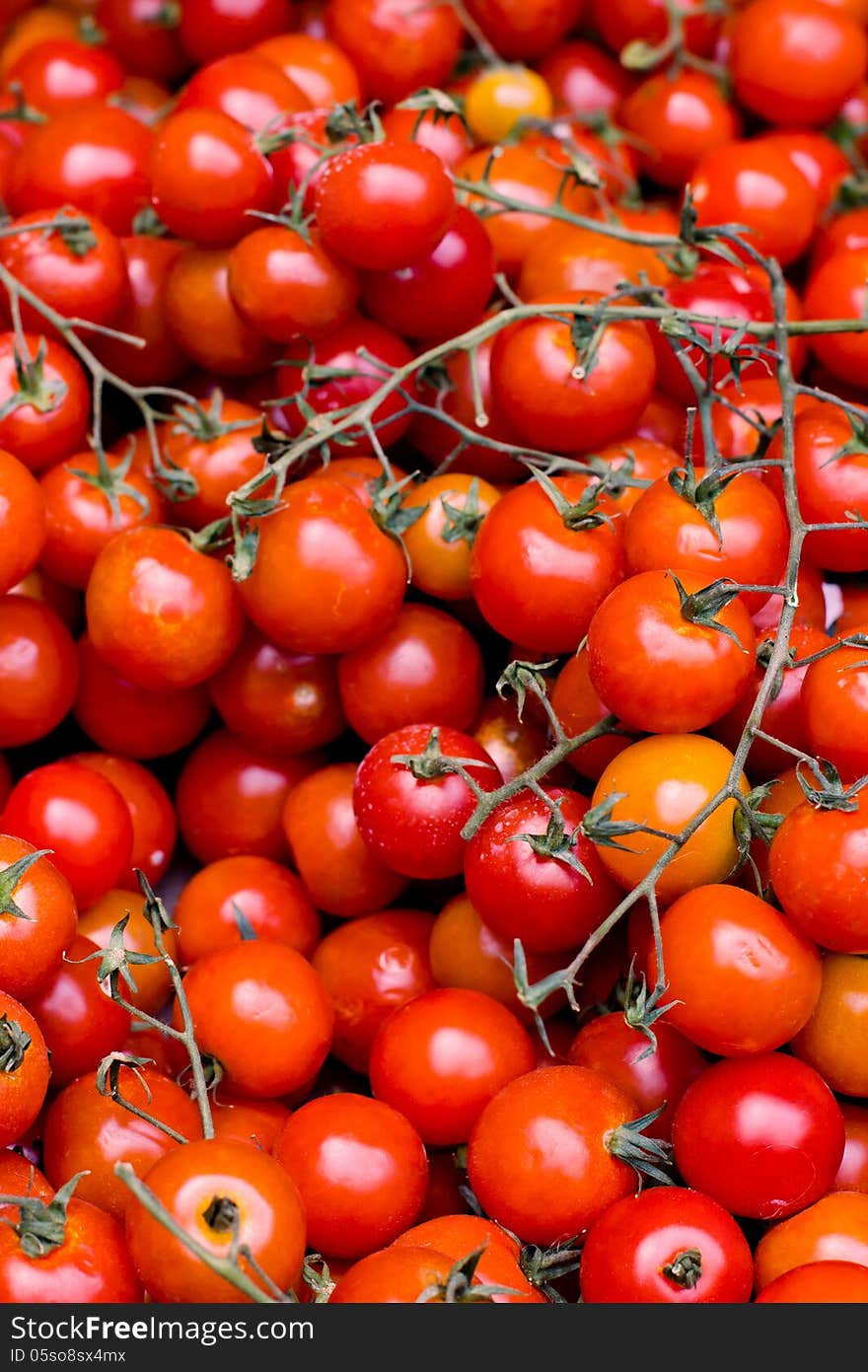 Ripe tomatoes, close-up, vertical