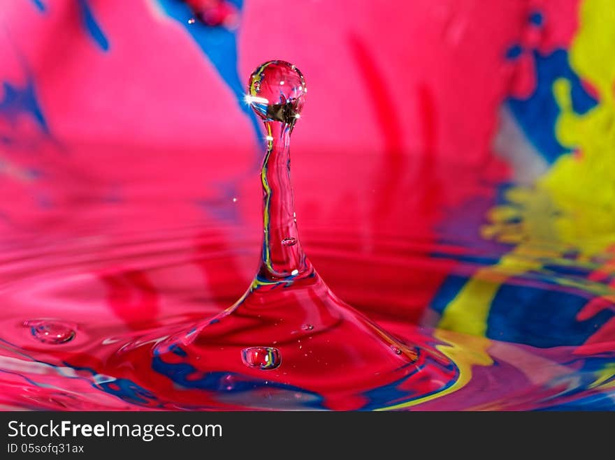 Close up of water drop bouncing from the water. Close up of water drop bouncing from the water