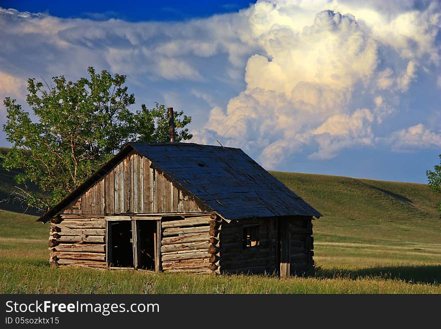 Storm Clouds over a Cabin