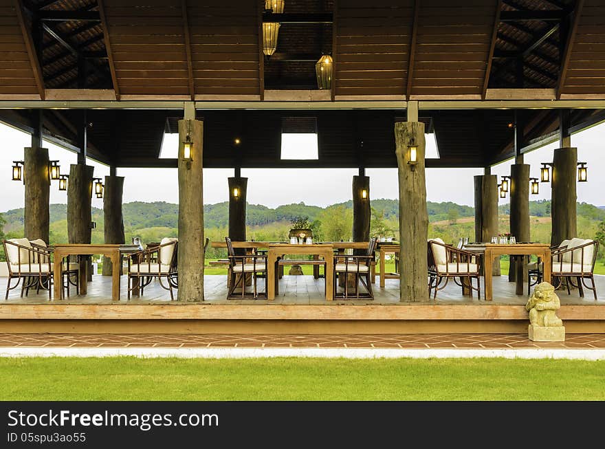 Oriental style open dining area in green environment