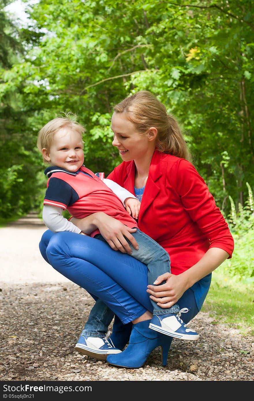 Happy mother and son having a nice day in the park