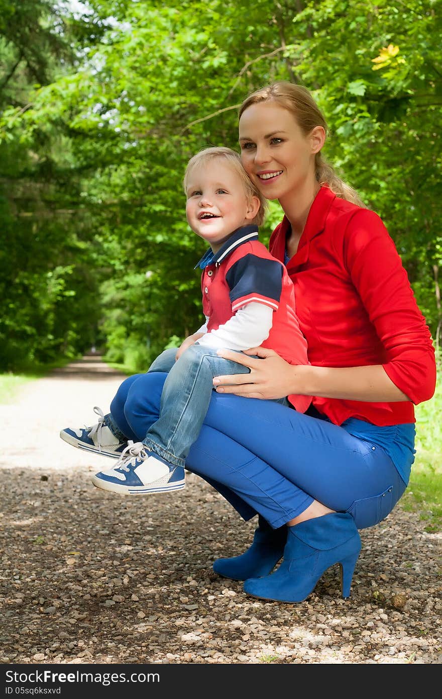 Happy mother and son having a nice day in the park. Happy mother and son having a nice day in the park