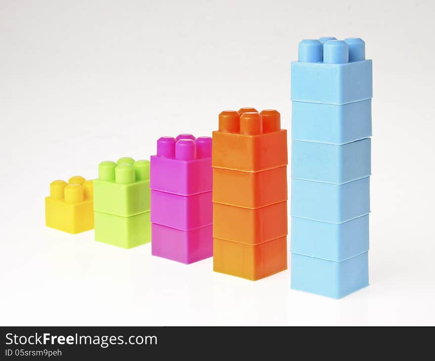 Perspective of increase color column in brick toy style on white background. Perspective of increase color column in brick toy style on white background