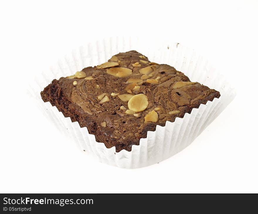 Almonds brownies in paper cup on white background. Almonds brownies in paper cup on white background