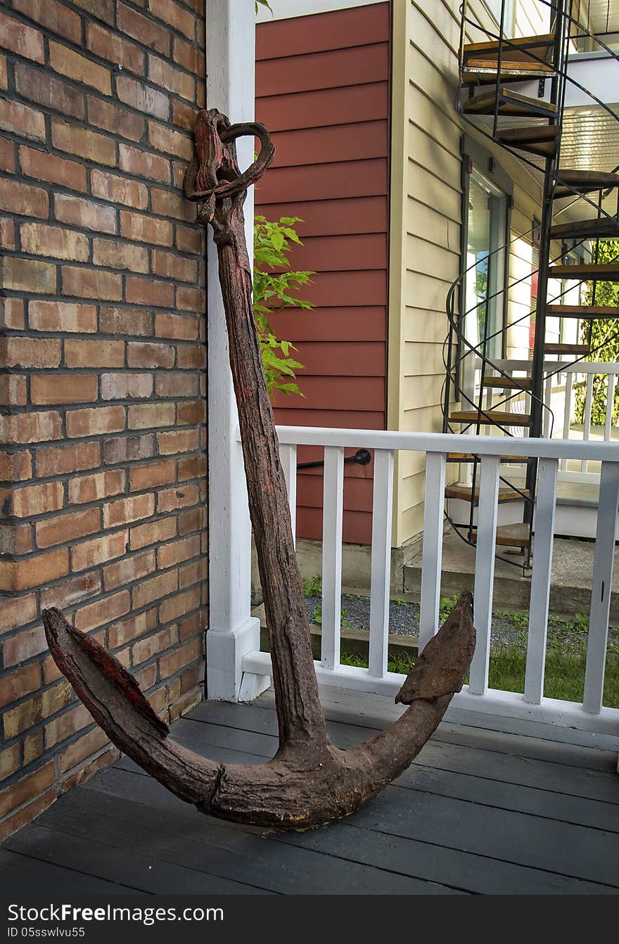 Rusted anchor on a front porch