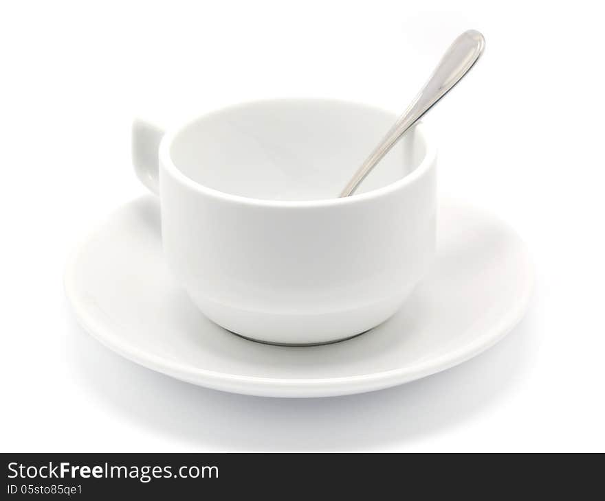 Empty coffee cup and spoon Isolated on white background