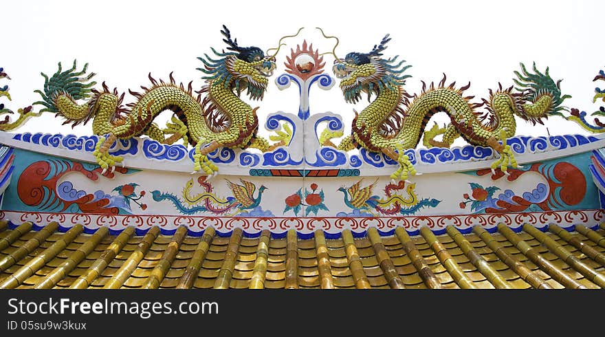 Colorful dragon statue on roof of temple, si chang island, Thailand