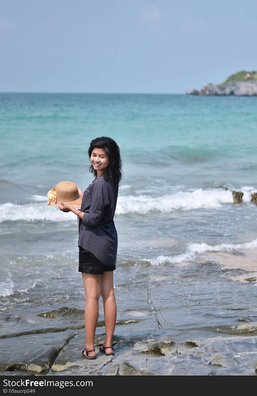 Beautiful Asian Girl Smiling At The Beach