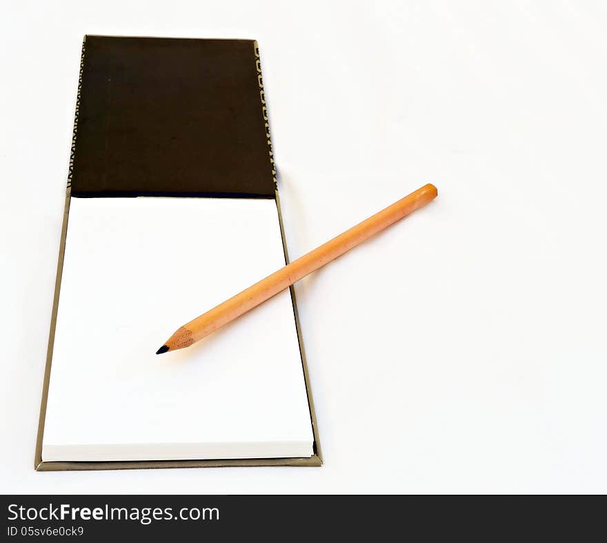 A pencil and notebook