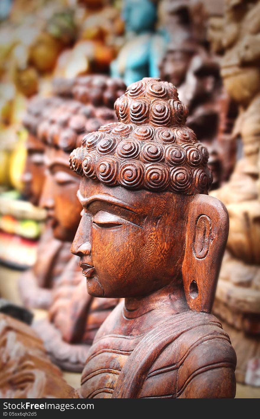 Wooden statue or idol of lord Buddha meditating