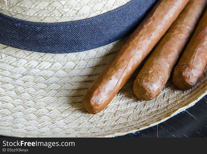 Cigar whit cuban typical hat. Cigar whit cuban typical hat