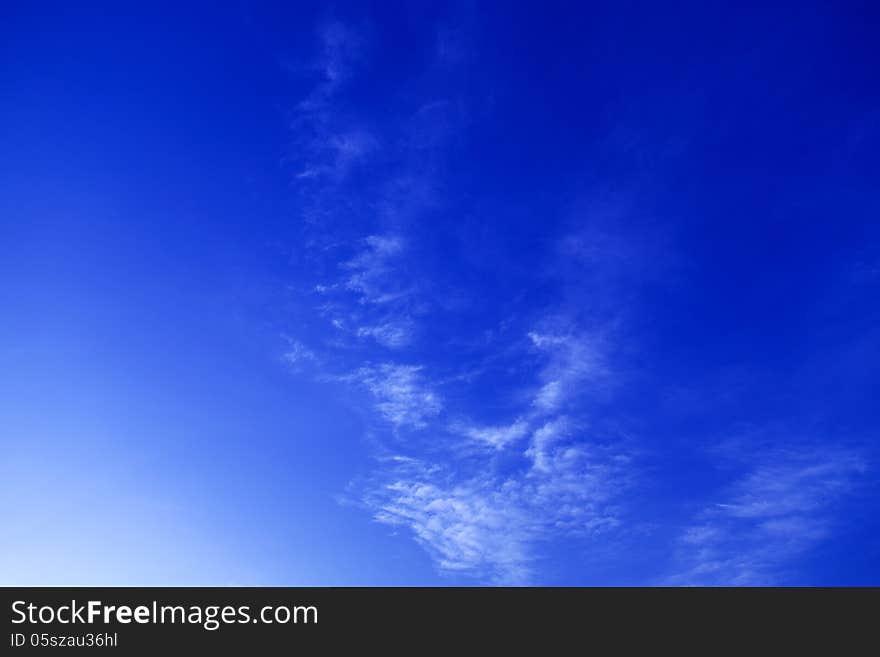 Sky blue background with clouds