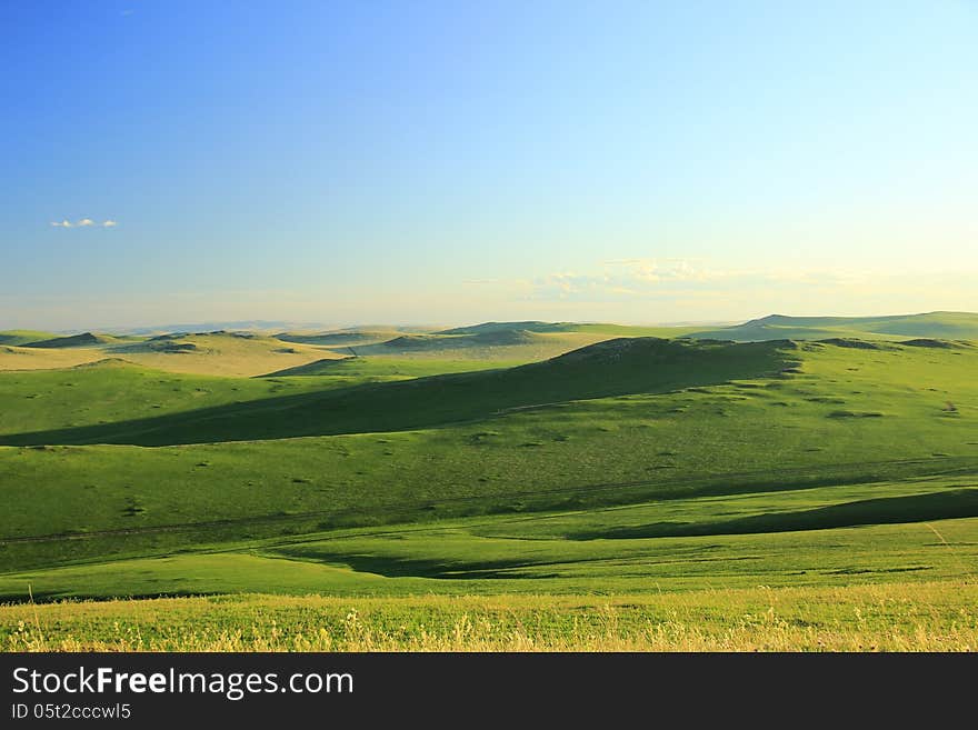 Expanse steppe Zabaykalskie impossible to embrace eyes. Photographed with one of the hills in the before sunset time. Expanse steppe Zabaykalskie impossible to embrace eyes. Photographed with one of the hills in the before sunset time