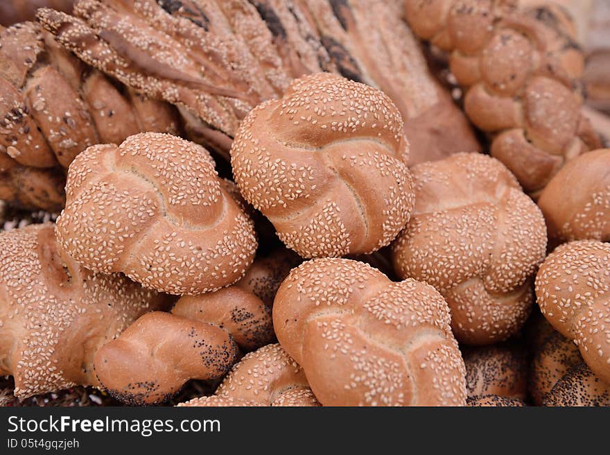 Variety of white bread with sesame seed and brown bread. Variety of white bread with sesame seed and brown bread