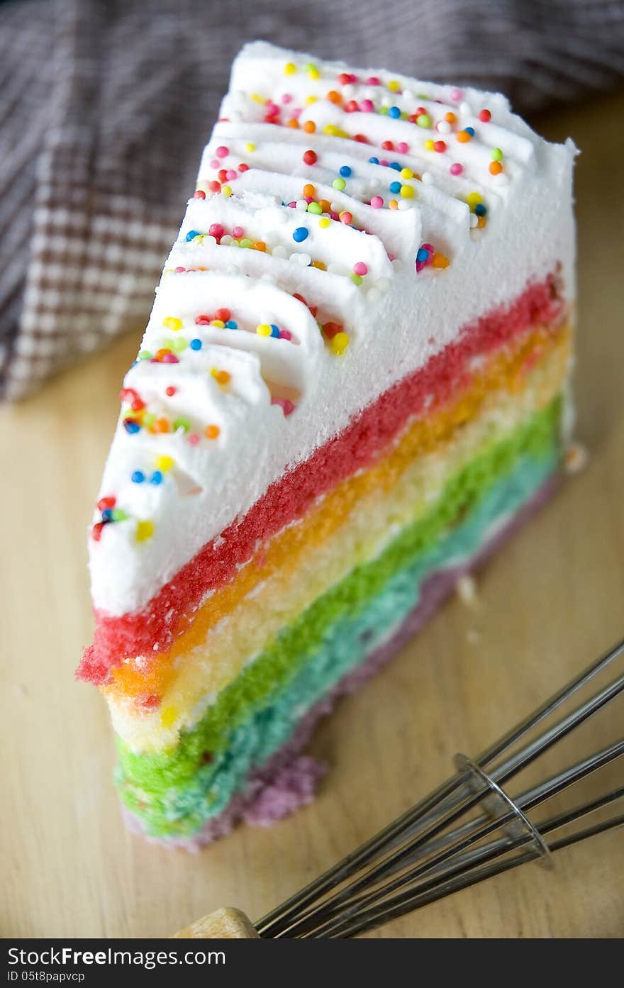 Close up top of colorful rainbow cake. Close up top of colorful rainbow cake