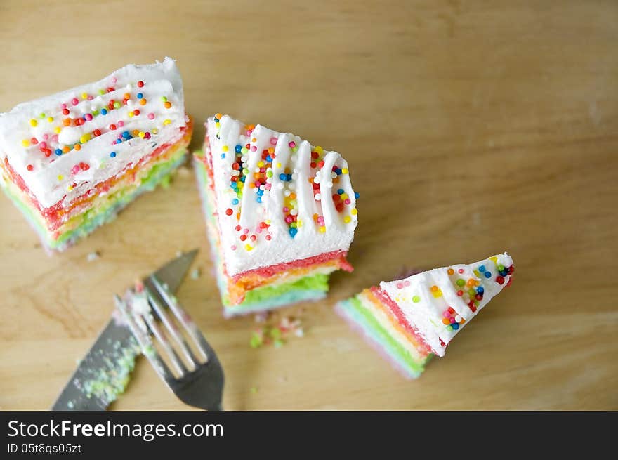 Top view of cutting colorful cake. Top view of cutting colorful cake