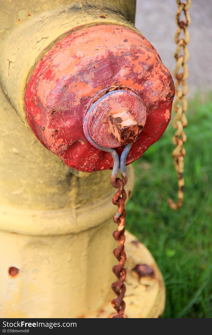 Old fire hydrant with rusty chains