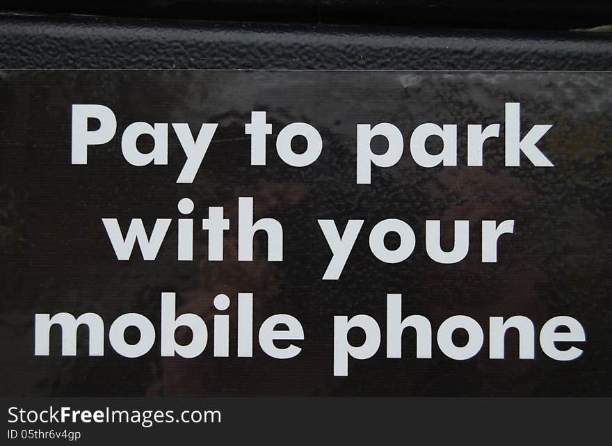 Pay to park sign