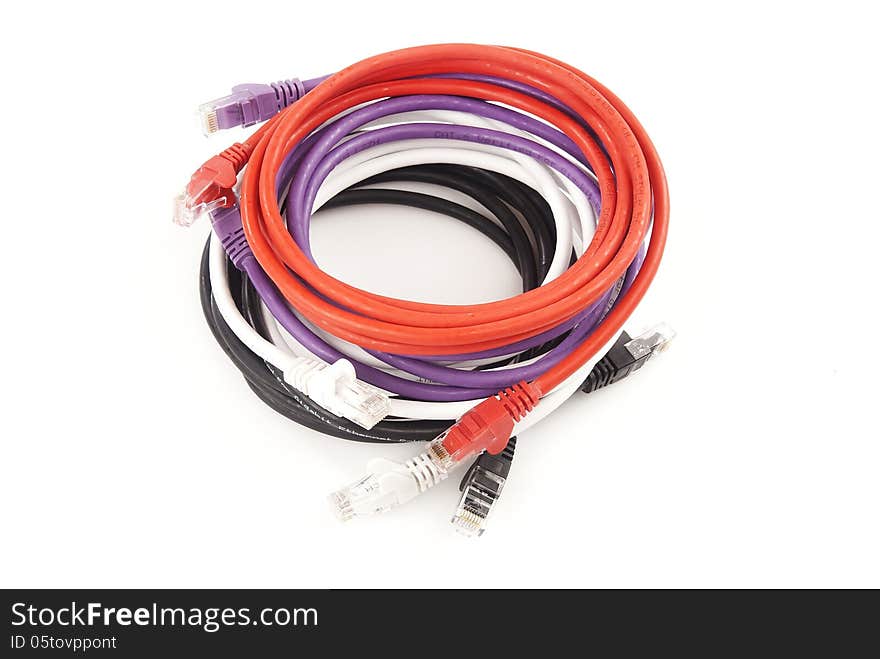 Multi coloured ethernet cables isolated against white