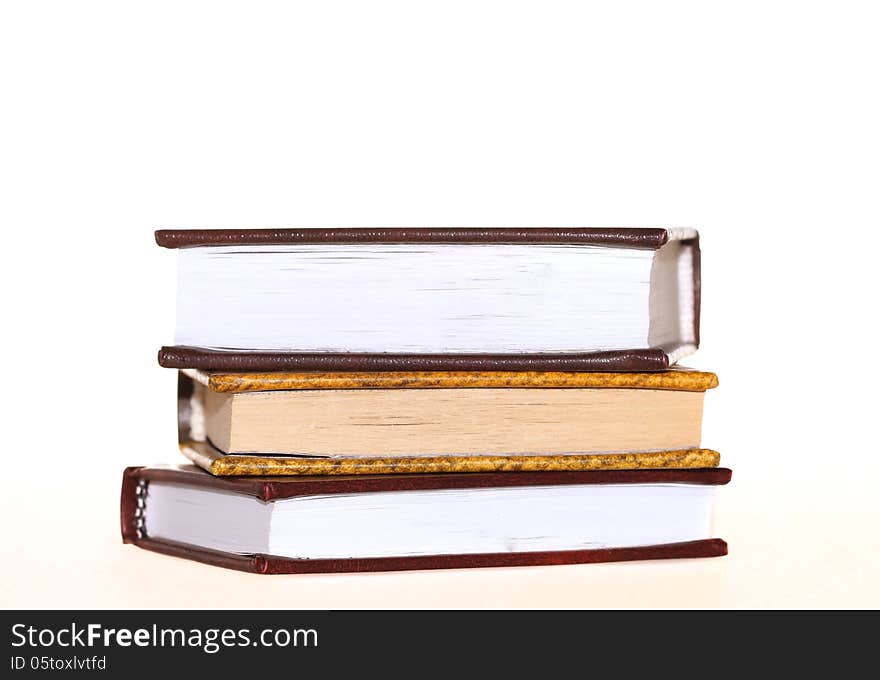 Three books lie over white background. Three books lie over white background