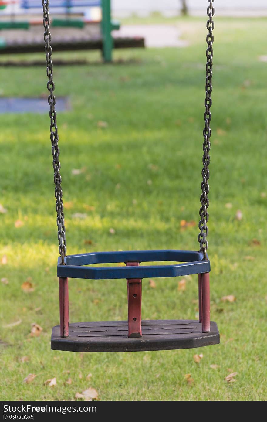 Childrens playground swing in a holiday park