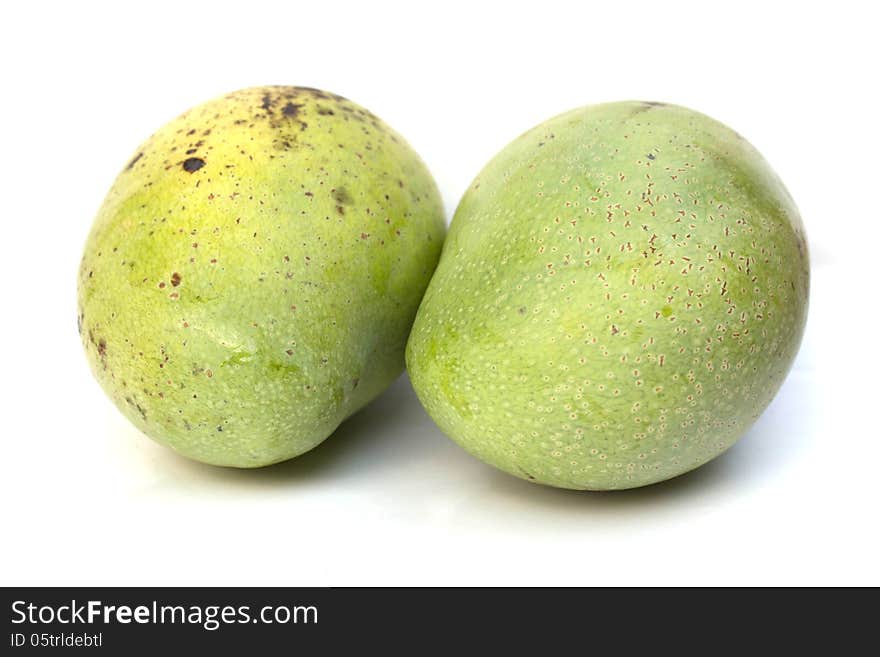 Green mango isolated on a white background