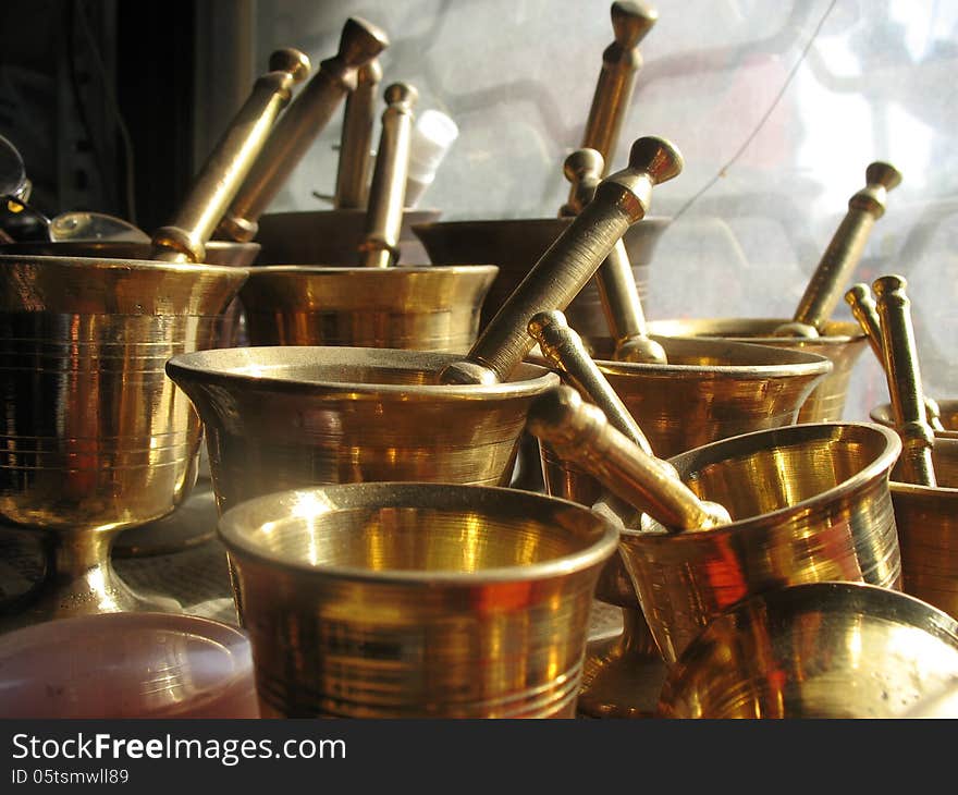 Copper and bronze wares in a junk shop. Copper and bronze wares in a junk shop