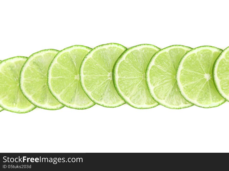 Limes sliced isolated on a white background.