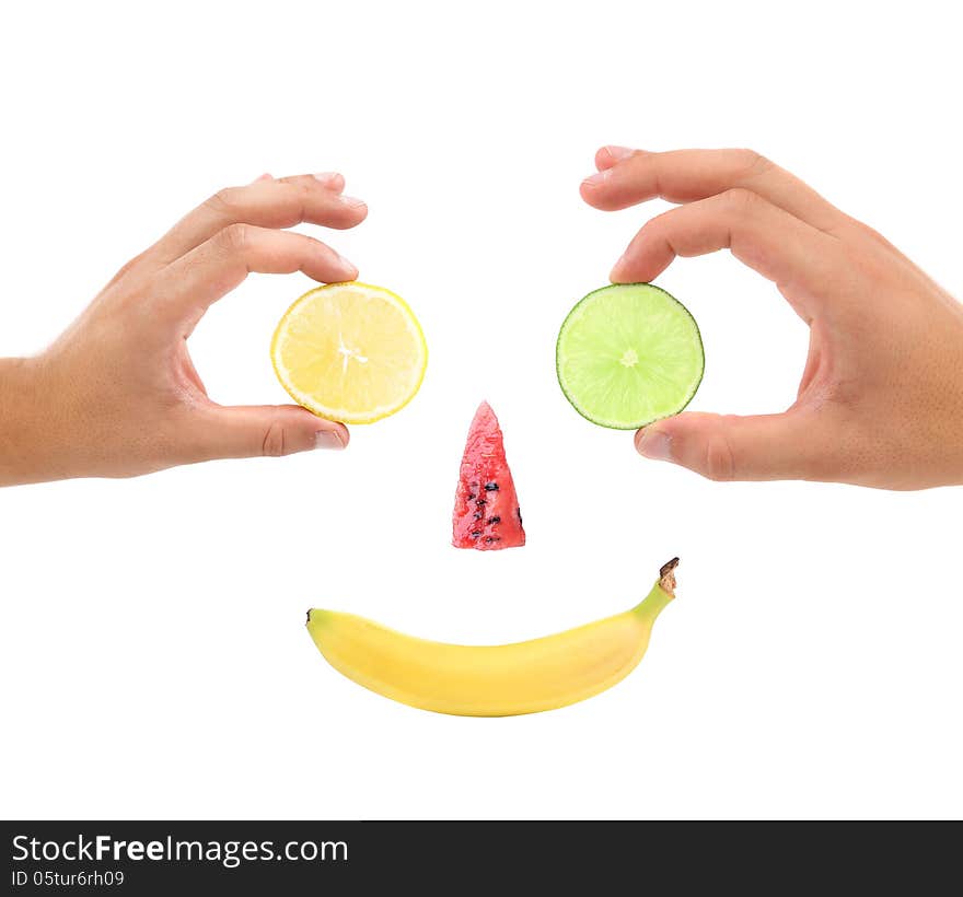 Little face made of fruit.. White background.