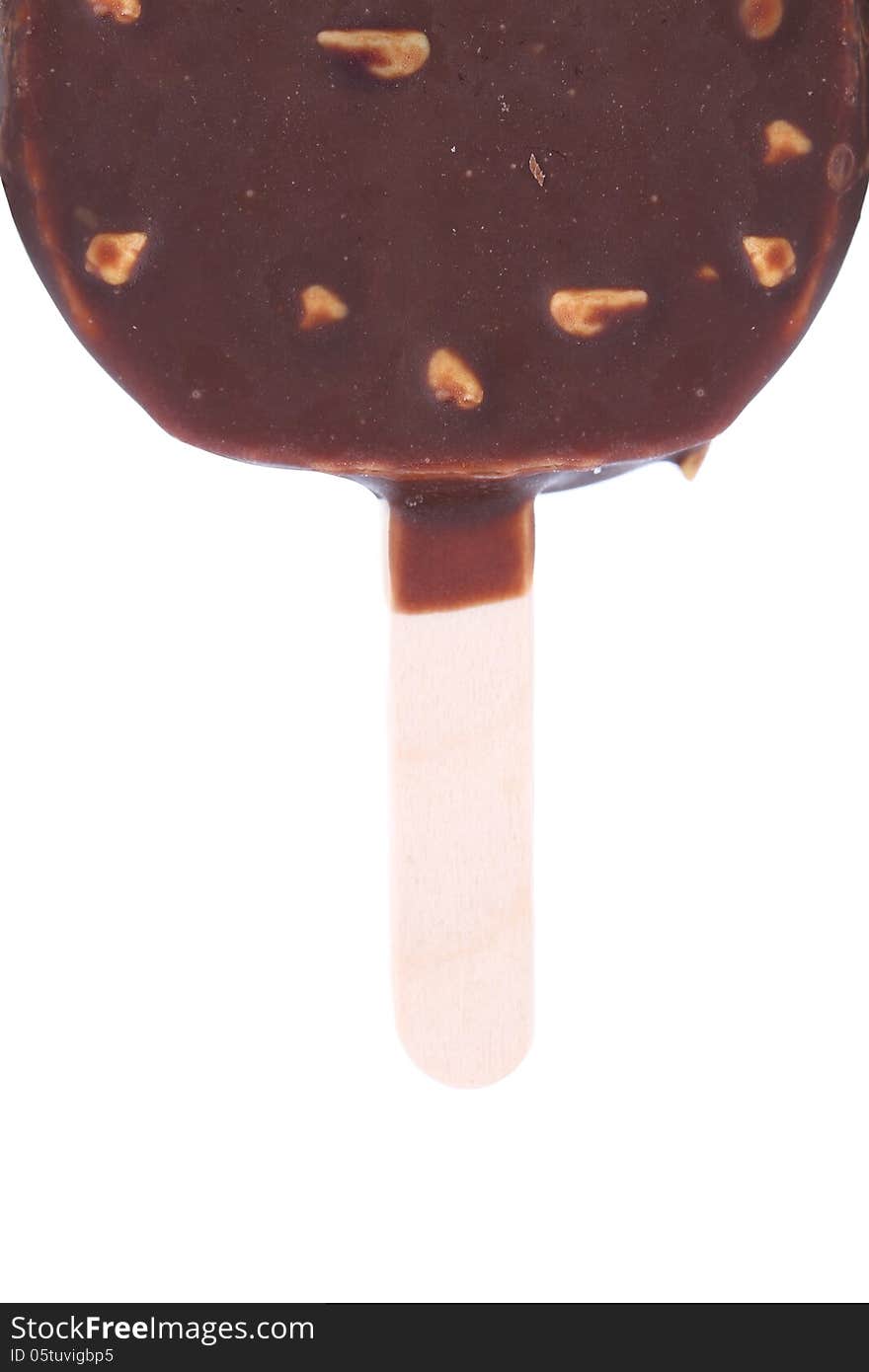 Chocolate-coated blocks of ice cream on stick. White background.