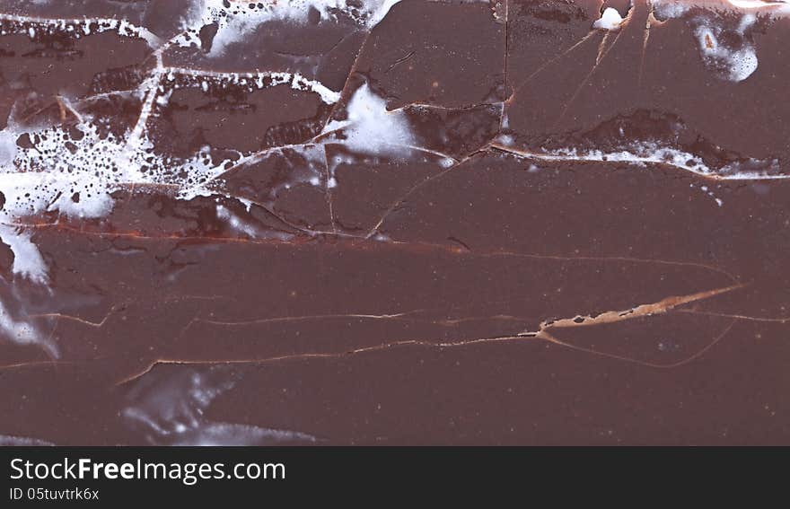 Background of chocolate vanilla ice cream. Macro.