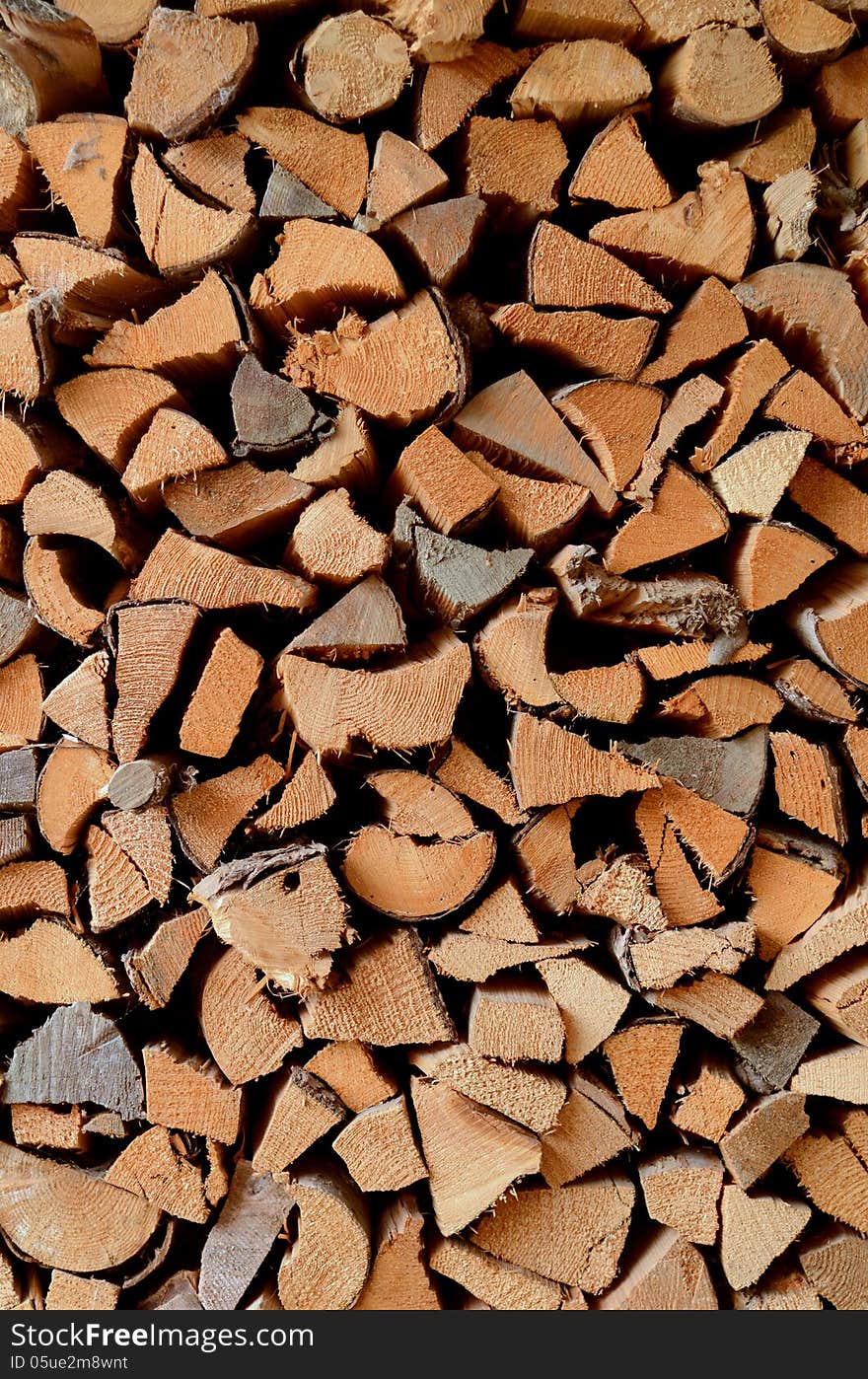 Winter Background Texture Of Split Stacked Wood. Winter Background Texture Of Split Stacked Wood