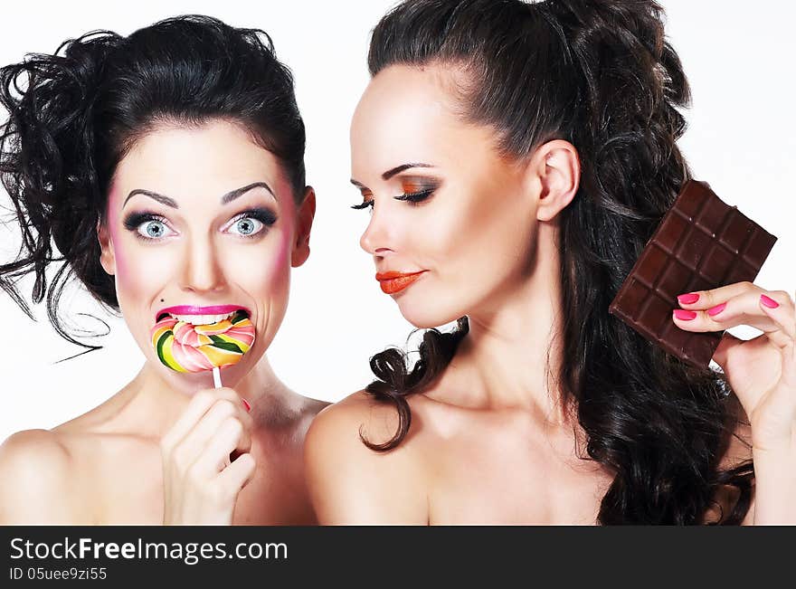 Glam. Couple Of Funny Women Holding Sweets. Positive Emotions. Vitality