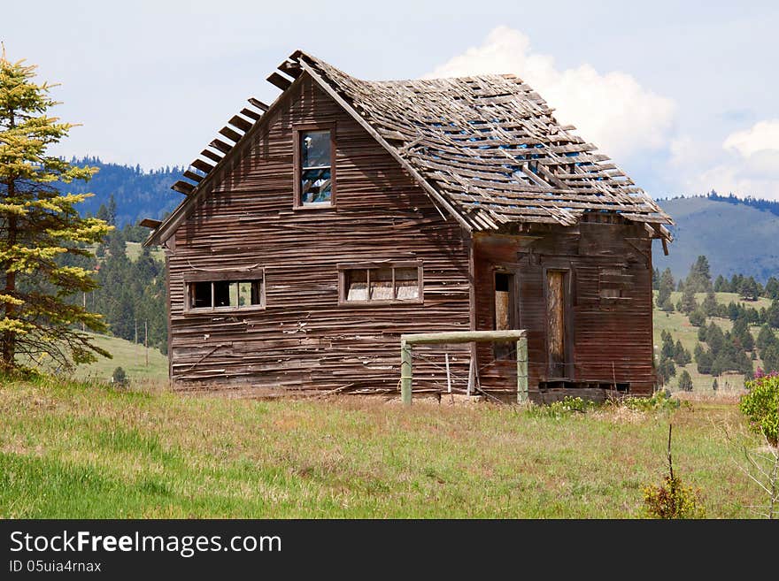 This image of the very old barn with the falling in roof was taken near Big Arm, MT. This image of the very old barn with the falling in roof was taken near Big Arm, MT.