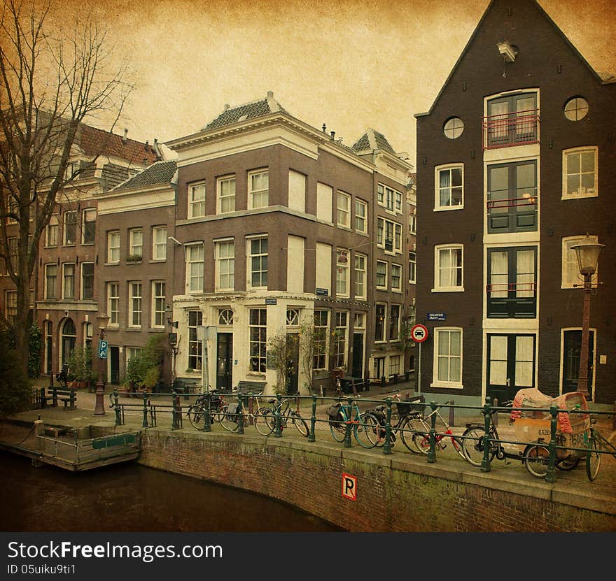 Amsterdam canals, Photo in retro style. Paper texture.